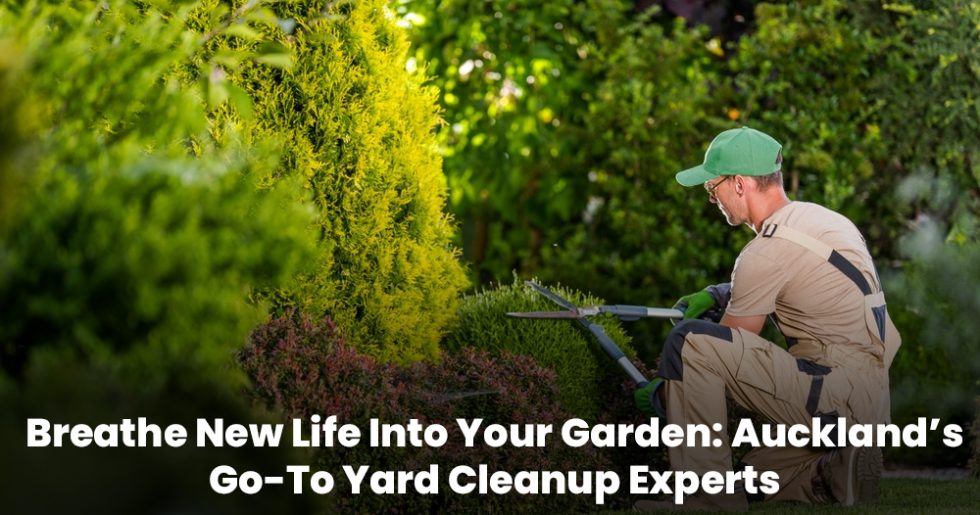 Gardener trimming plants during professional yard cleanup services in Auckland.