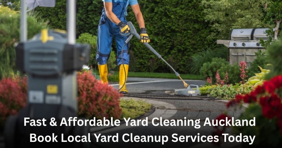 professional worker pressure washing driveway for yard cleaning services in Auckland